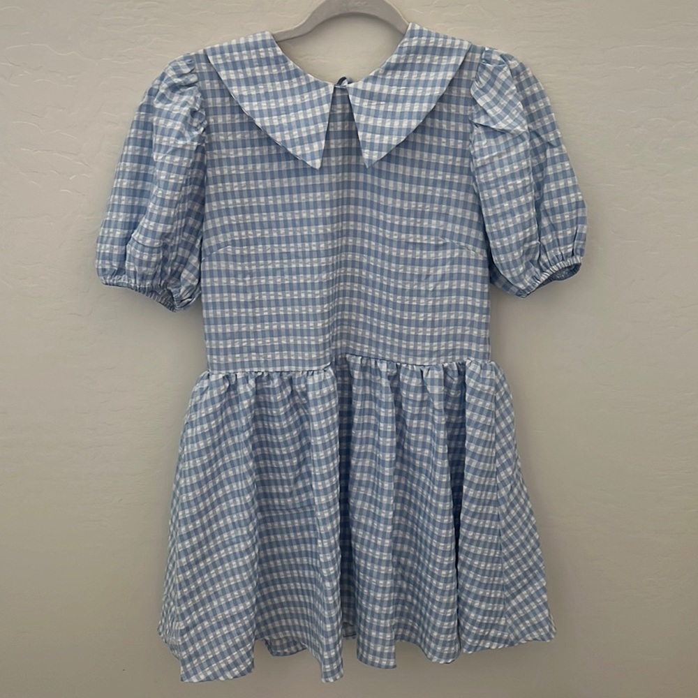 Pastel blue gingham dress. Large collar and puffy sleeves. Loose fitted.